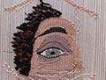 Regard bleu sur Janus haute-lice et tissus